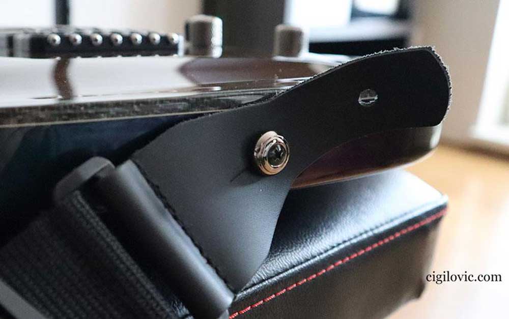 Double strap holes for flexibility